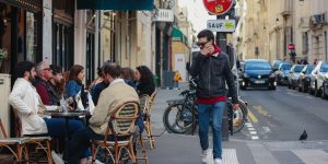 street life in paris with outdoor cafe