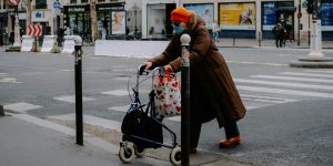 elderly person crossing on the road